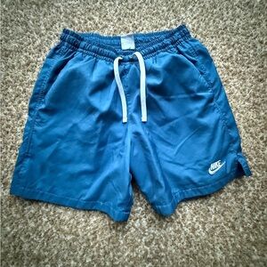 Men’s Nike Blue Athletic Shorts with mesh liner size small, blue.
